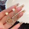 Pendientes de alta calidad de Corea del Sur con forma de hoja de loto y incrustaciones de diamantes para Mujer Nuevo Retro estilo Hong Kong elegante celebridad de Internet elegantes pendientes versátiles moda