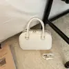 Bolso pequeño elegante de alta gama para mujer 2026 Primavera Nueva Moda Bolso Cruzado Versátil Bolso de Mano de Nicho con Lazo