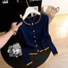 Nuevo cárdigan de punto con bloques de color estilo coreano para mujer, temporada Primavera y Otoño 2026, top versátil ajustado a la moda coreana para mujer