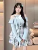 Conjunto de Duas Peças para Mulheres Plus Size: Tricô Off-Shoulder e Saia de Espinha de Peixe Xadrez, Outono 2026, Estoque Pronto para Exportação
