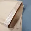 Sacolas de Papel Transparentes em Estoque em Shenzhen 55*78 Sacolas Lisas Sacolas Compostas Papel-Plástico Totalmente Transparentes Sacolas Tecidas Seladas Kraft para Armazenamento