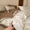 Conjunto de cama de quatro peças em algodão escovado Classe A, novo lençol de cama 100% algodão, capa de edredom, lençol com elástico, conjunto de cama de três peças, têxteis para o lar de Nantong