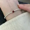 Pulseira de Contas de Prata Cinábrio Feminina 2025 Novo Ano do Zodíaco Pulseira Vermelha Círculo Liso Pulseira Fina Pulseira Empilhável