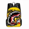 Mochila Nueva para Estudiantes Temu Amazon 16 pulgadas Monstruo de Dibujos Animados Estilo Graffiti Impresión Gran Capacidad Reducción de Peso Fabricante
