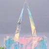 Suministro directo de fábrica bolsa de mano de PVC con láser color mágico bolsa de embalaje para ropa de compras bolsa de compras para supermercado centro comercial bolsa de almacenamiento de plástico