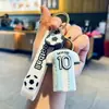 Llaveros de goma blanda 3D de la serie de camisetas de fútbol transfronterizas, colgantes para bolsos, pequeños regalos para máquinas de garra, venta al por mayor