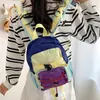 Mochila funcional de estilo moderno para exteriores 2026, con bloques de color, ligera, impermeable y de gran capacidad, adecuada para hombres y mujeres, ideal para senderismo