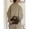 Bolso de hombro versátil para mujer, nuevo y moderno 2026, bolso de mano retro para otoño/invierno, bolso almohada, bolso bowling