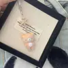 Colgante de Peluche con Dibujos Animados Flockado de Moda Encanto Linda para Bolso Correa de Teléfono para Pareja Regalo Al Por Mayor
