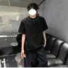 Diseño de alta calle con decoración de remaches metálicos, versátil camisa de manga corta para hombre estilo Hong Kong, corte holgado, marca de moda, top casual y elegante