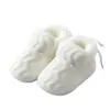 Nuevo modelo venta directa de fábrica zapatos para bebé 0-12 meses transfronterizos zapatos de algodón para bebé invierno zapatos de gamuza de suela blanda para niños y niñas