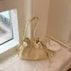 Bolsa tote com cordão única e estilosa para mulheres, novo modelo da primavera de 2026, simples e casual, elegante bolsa de ombro para o dia a dia, moderna