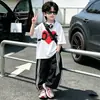 Conjunto de Verano 'Amor' para Niños 26 Estilo Nuevo Camiseta Elegante de Manga Corta y Pantalones Antimosquitos Conjunto de Dos Piezas para Niños Mayores