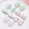 Otoño e Invierno lindo panda sosteniendo bambú nalga de panda parche de resina DIY funda de teléfono pasador accesorios para el cabello material al por mayor