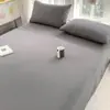 Sábana de algodón puro lavado Clase A pieza individual, juego de tres piezas de funda de edredón y funda de almohada de algodón puro para dormitorio de estudiante color liso 1.5m Kangdan