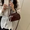 Bolso de Mano Cuadrado Pequeño de Moda al por Mayor para Mujer Verano 2025 Nuevo Estilo Bolso de Hombro con Lazo de Perla Bolso Cruzado de Moda