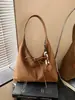 Bolsa de mano casual de gran capacidad estilo coreano, un bolso de hombro de lunares moderno y minimalista para mujer, un bolso de mano ligero y elegante para ir al trabajo