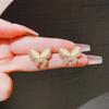Pendientes de mariposa con diamantes y piedra de ojo de gato con diseño de nicho, estilo coreano, sencillos y de alta gama.
