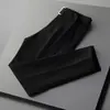 Pantalones elásticos de seda helada de nuevo estilo para hombre de verano, pantalones cortos ajustados estilo coreano, pantalones casuales británicos