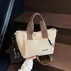 Bolso Minimalista Vintage para Mujer 2026 Nuevo de Moda Versátil Bolso para el Almuerzo Bolso Cesta de Nicho para Viajes Diarios