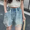 Jeans de Verano 2026 Estilo Nuevo Moda para Niñas Versátil Perlas Deshilachados Pantalones Cortos para Niños Mayores Ropa de Exterior de Verano