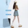 Falda Corta de Mezclilla Bordada para Mujer Primavera Delgada 2025 Nueva Cintura Alta Cubre Piernas Forma A Antiluz Falda Pequeña para Cadera