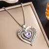 Collar de piedra de nacimiento transfronterizo europeo y americano para mujer, colgante de collar de corazón con piedra de nacimiento en oro rosa, collar con forma de corazón incrustado de diamantes al por mayor
