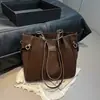 Bolsa de mano casual Shuai Mijia para mujer, gran capacidad, nueva moda 2026, bolso de hombro, bolso de mano casual para el trabajo con textura