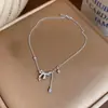 Collar con Colgante de Zirconia con Forma de Lazo Gota de Agua Estrella Estilo Europeo y Americano Lujo Ligero Sentido del Diseño Cadena de Clavícula de Nicho Accesorio de Collar Versátil para Mujeres