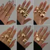 Europa e Estados Unidos estilo ins transfronteiriço metal brilho gota d'água anel de abraço design de personalidade feminina senso de design anel ajustável anéis