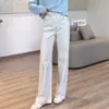Súper versátil ¡Una mirada y te enamoras! ¡Toro Blanco! Etiqueta tejida Costuras de contraste minimalistas Elástico en cuatro direcciones Jeans Elegante Pantalones de pierna estrecha Pierna ancha