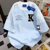 Camiseta de Manga Corta 100% Algodón Puro Estilo Dulce-Fresco Europeo y Americano con Tres Rayas para Hombres y Mujeres, Verano Ajuste Holgado, Adelgazante Casual de Marca de Tendencia