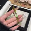 Pulsera tejida a mano de trébol de cuatro hojas, estilo nuevo 2025, estilo Ins, nicho, fresca y brillante, pulsera de amistad para parejas para mujeres, verde