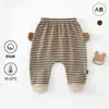 Pantalones de algodón suave Clase A para bebé de otoño, ropa exterior para bebé de pierna ancha, pantalones casuales a rayas con cara sonriente para niños