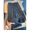 Pantalones jacquard de estilo retro americano con estampado oscuro, colección de verano para hombre, con un diseño fluido de alta gama, corte recto y un ajuste relajado y holgado para uso casual.