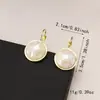 Pendientes de botón de estilo francés de lujo ligero de nicho de diseñador Fish Ji imitación perla redondos geométricos versátiles dulces pendientes pendientes