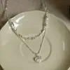 Collar con colgante de corazón de circonita para mujer, nuevo modelo 2026, artesanía exquisita, cadena versátil para la clavícula, joyería de lujo ligero y de alta gama