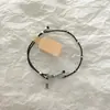 Pulsera Trenzada Simple de Estilo Chino Nuevo con Pez Pequeño y Mariposa Diseño de Nicho Estilo Literario de Alta Gama Joyería de Mano Versátil