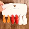 Brincos Personalizados de Moda Ins Europeus e Americanos Transfronteiriços com Design de Nicho para Mulheres, Conjunto de Brincos de Resina Laranja e Verde Fruta com Três Tubos