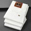 Jeans Blancos de Alta Gama Estilo Business Italiano para Hombre, Pantalones Elásticos de Corte Ajustado, Versión Engrosada Otoño e Invierno 2026 con Forro Polar