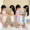 Conjunto de Verão de Comércio Exterior para Meninas, Blusa Regata com Borda Franzida, Novo Estilo 2026, Conjunto de Duas Peças Elegante de Cor Sólida com Regata e Shorts, Conjunto de Verão de Duas Peças