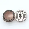 Hebilla metálica de cuatro piezas al por mayor con patrón patrón hebilla oculta de doble cara de 1.5 cm color chaqueta de plumas botones planos para mujer