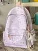 Mochila escolar transfronteiriça para meninas, mochila de nicho e fofa para estudantes do ensino fundamental e médio, grande capacidade, alto valor estético, mochila de viagem doce para meninas jovens