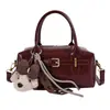 Bolsa Boston Transfronteiriça Feminina 2026 Simples Novo Estilo Design de Fivela de Cinto de Nicho Bolsa de Ombro Tendência Moda Bolsa de Ombro Único