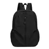 Mochila simple unisex de color sólido, ligera, elegante, portátil, adecuada para viajes y deportes al aire libre, al por mayor