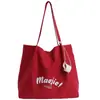 Bolsa Tote Popular Transfronteiriça para Meninas, Nova Bolsa de Ombro com Estampa de Letras, Mochila Casual para Estudantes Universitários no Trajeto para a Aula