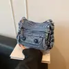 Bolso casual de mezclilla lavado con múltiples bolsillos y diseño en capas, simple y duradero, adecuado para ir al trabajo, se puede llevar al hombro o cruzado.