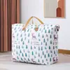 Bolsa de edredom não tecida portátil mais vendida à prova de umidade para armazenamento de roupas e edredons, bagagem extragrande para embalar e mudar