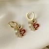 Pendientes del Año del Dragón, diseño de nicho, pendientes de la fortuna de alta gama, hebilla de oreja roja para mujer, nuevos pendientes de estilo chino de estilo nacional.
