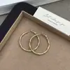 Pendientes de aro de bambú lisos de estilo europeo y americano para mujer, modernos y populares, con diseño único, de lujo ligero de alta gama, pendientes versátiles